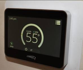 Lennox thermostat showing 55 degrees as it was first installed in a Wichita Home