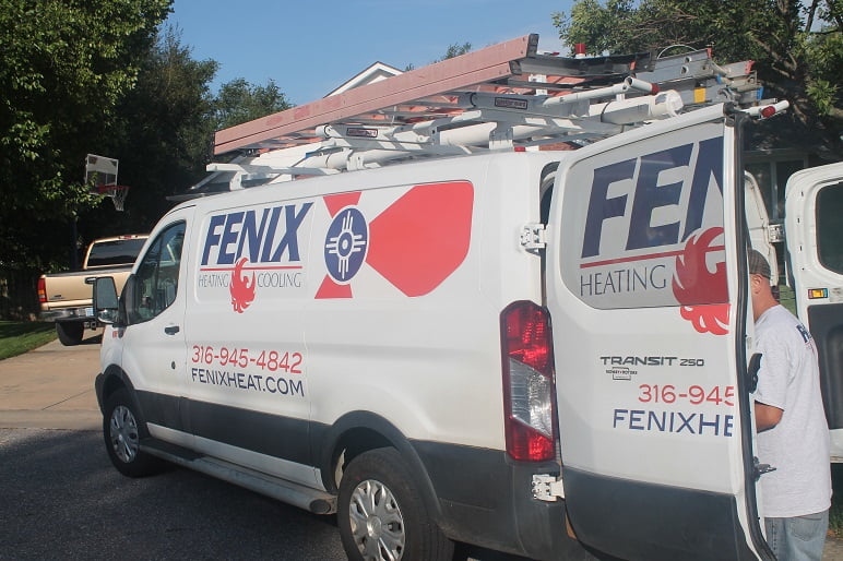 Fenix Heating & Cooling van parked in a West Wichita neighborhood near Maize Rd.